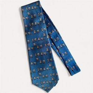 HERMÈS Blue Tie with tan figurines